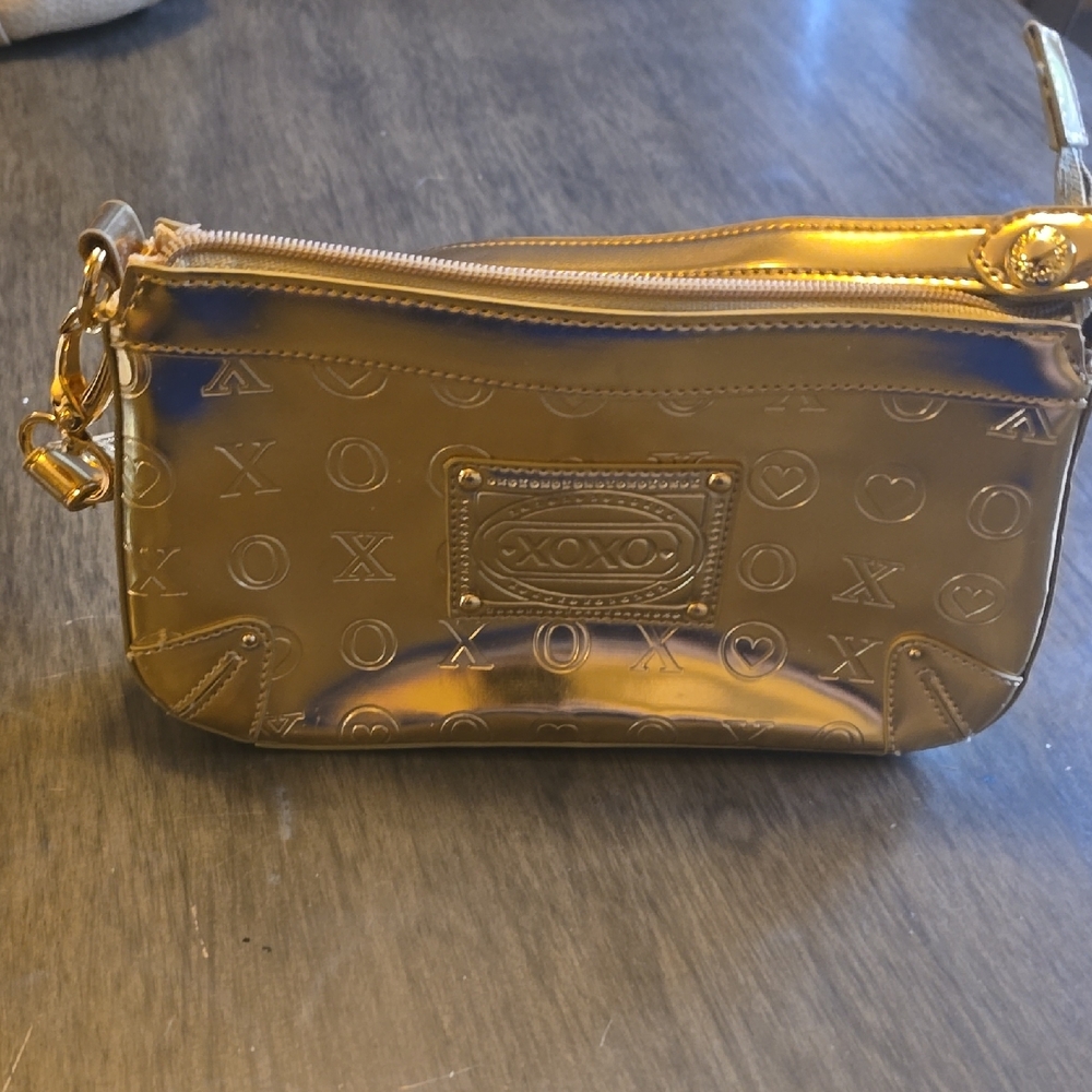 XOXO Gold Clutch Wristlet with Luxurious Metallic Finish